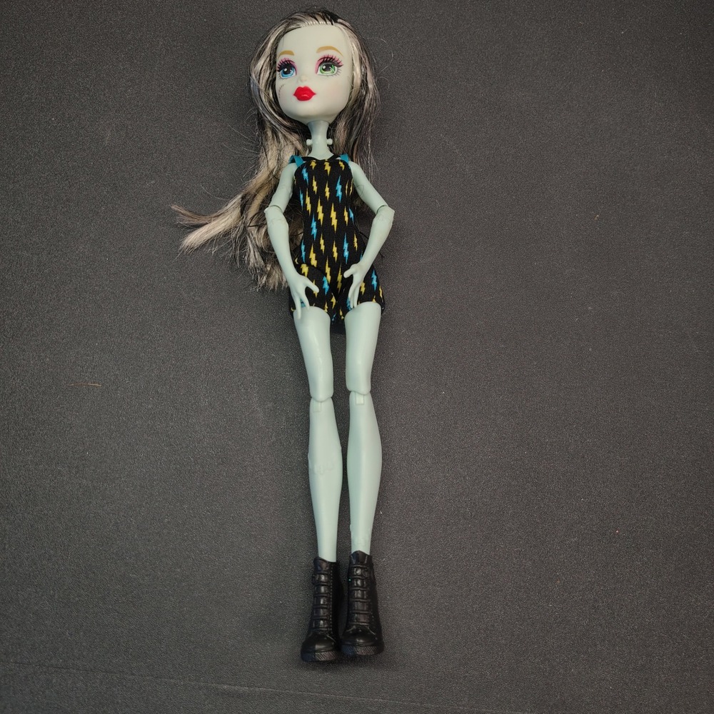 Monster High Frankie Stein Doll Black Boltin Bicycle Lightning Romper